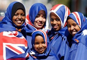 Muslim girls wearing Australian flag over their bodies and heads