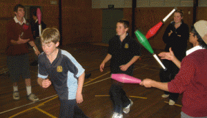 Children partaking in juggling and drama activities