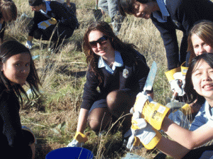 Mitchell & Quirindi High School students digging in a field