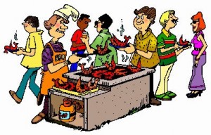 People enjoying a barbequed meal together