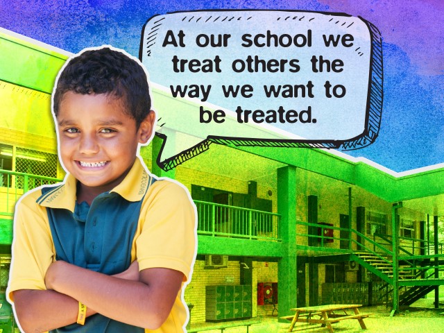 Boy with speech bubble stating: At our school we treat others the way we want to be treated.